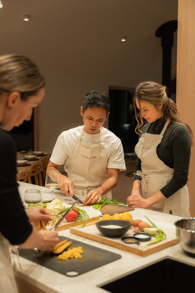 alt="Raymond with guests during cooking class in Dharma Resort, Muhu Estonia"